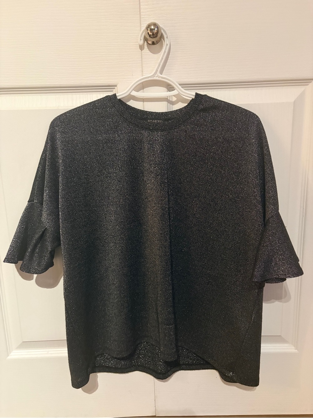 Soaked in Luxury top